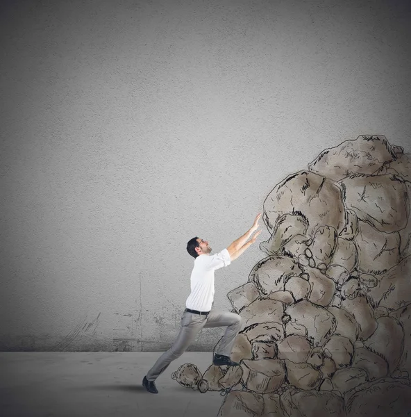 Businessman struggling to climb the success — Stock Photo, Image