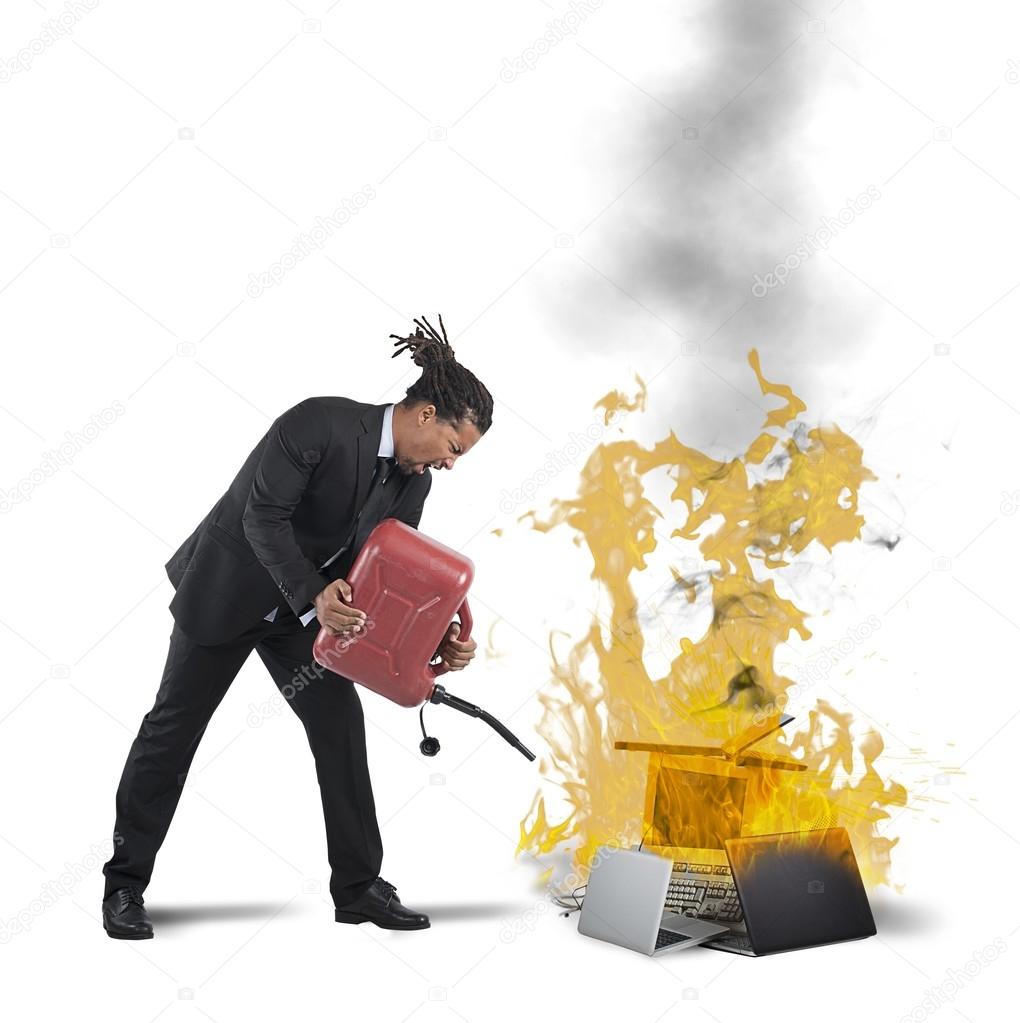 Businessman burns computers