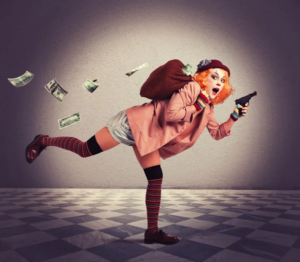 Clown escapes with the loot — Stock Photo, Image