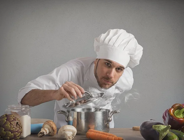 Chef take a smell his dish — Stock Photo, Image