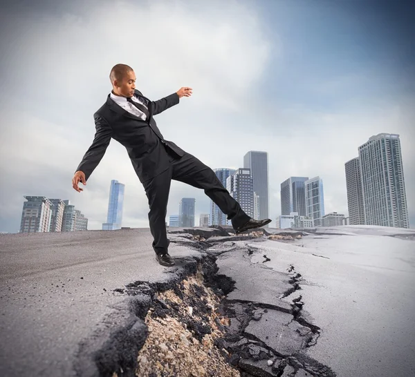 Businessman overcome a crisis break — Stock Photo, Image