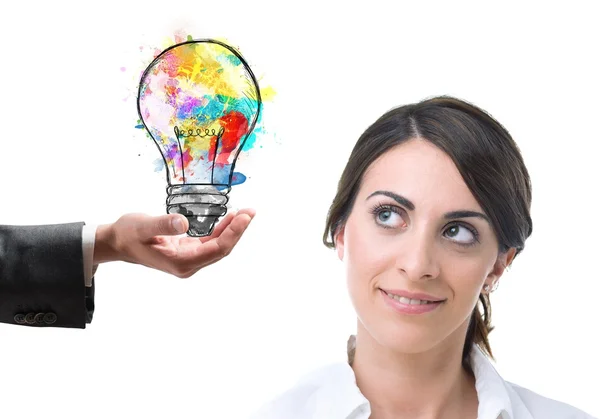 Businesswoman suggests a bright idea — Stock Photo, Image