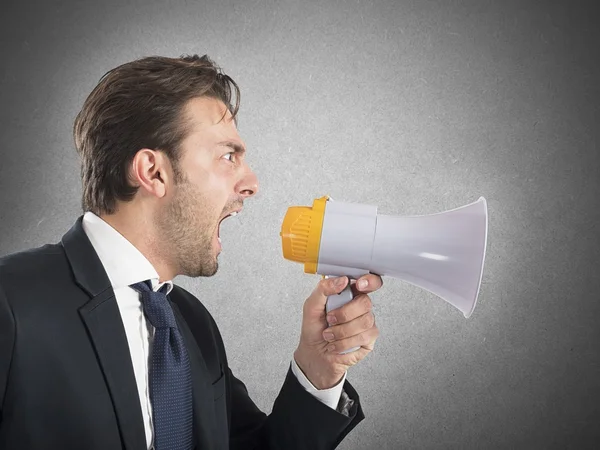 Boss shouting with his megaphone — Stock Photo, Image