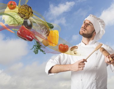 Chef plays a harmony of food clipart