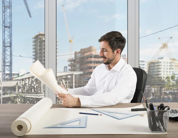 Architect looking at work project — Stock Photo, Image