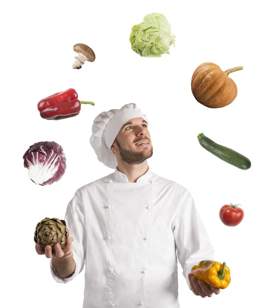 Chef plays with the vegetables — Stock Photo, Image