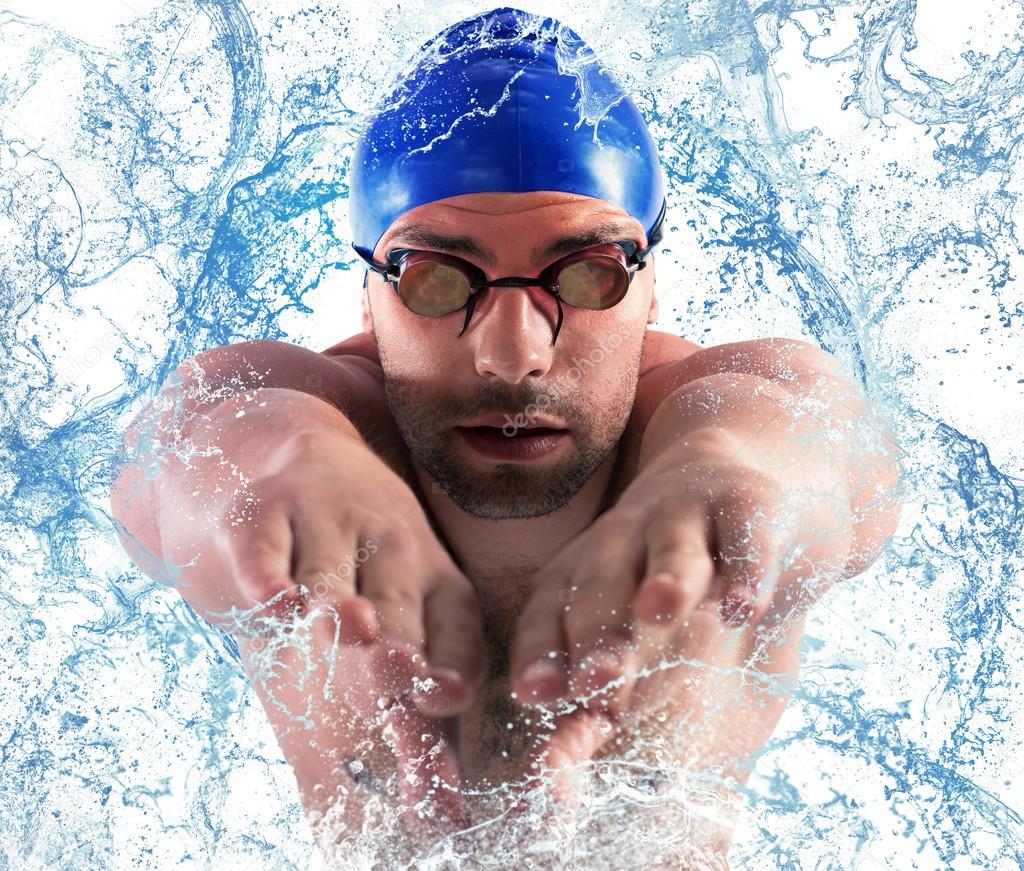 Swimmer enters the water