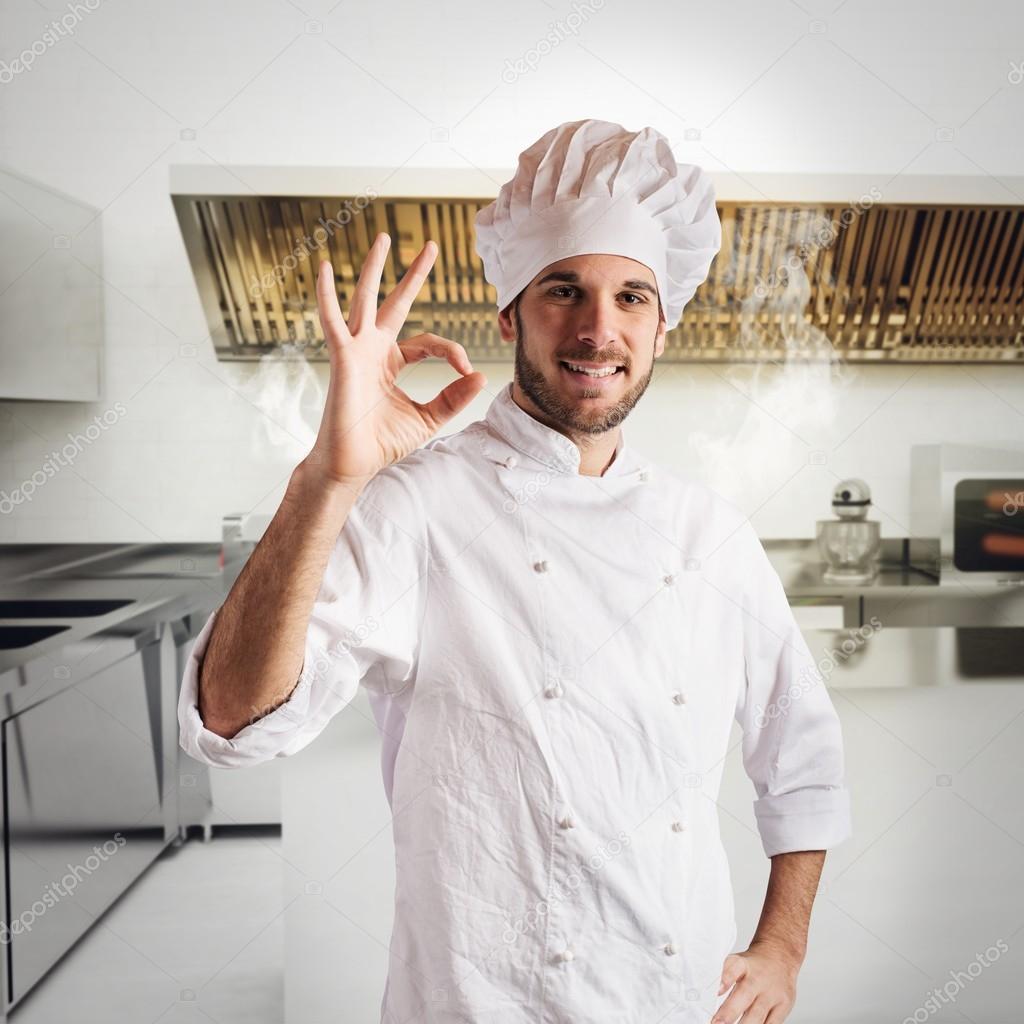 Confident chef in kitchen