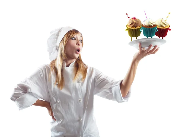 Woman chef surprised by pastries — Stock Photo, Image