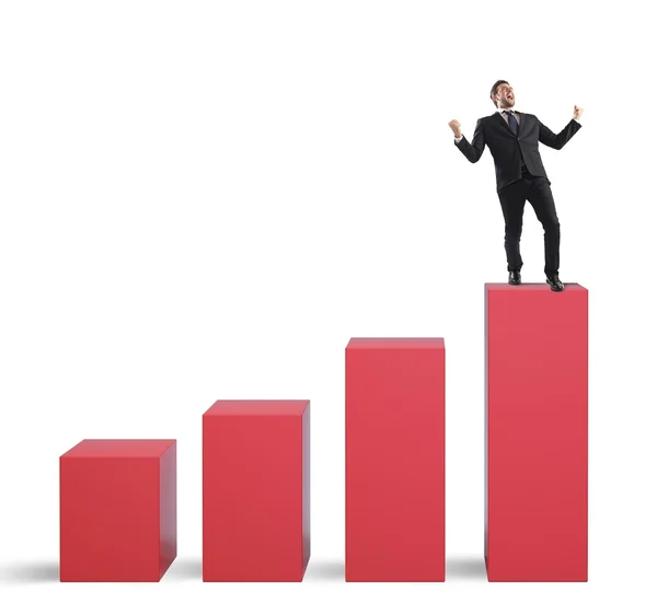 Affärsman på toppen av en statistik bar — Stockfoto