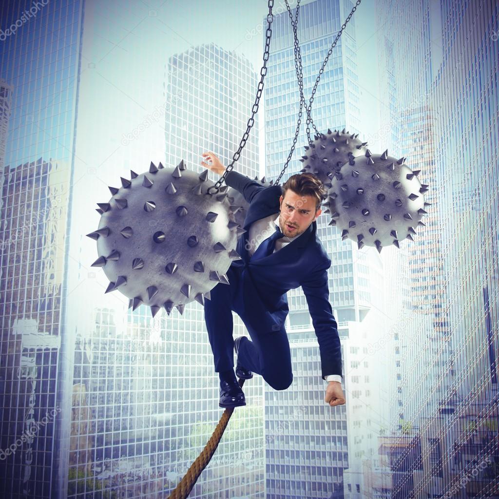 businessman balanced on rope