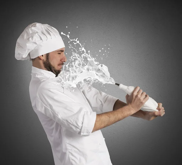 Chef splashed by the cream — Stock Photo, Image