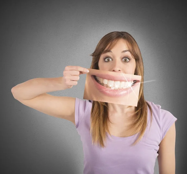 Girl shows her smile — Stock Photo, Image