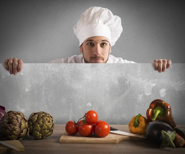 Cucinare con un cartellone bianco — Foto Stock