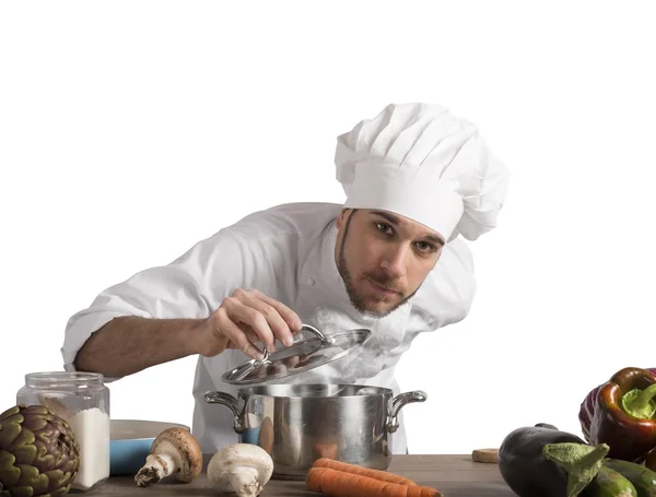 Chef smelling the food — Stock fotografie