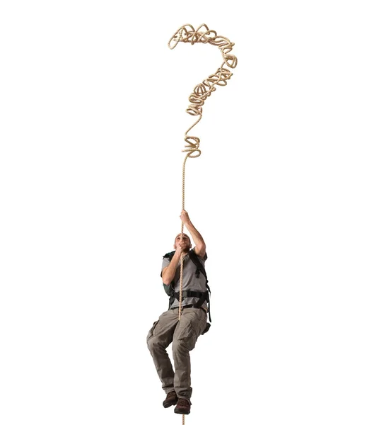 Explorer clinging to a rope — Stock Photo, Image