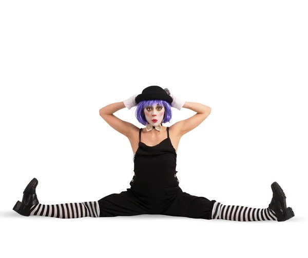 Woman clown makes a big split — Stockfoto