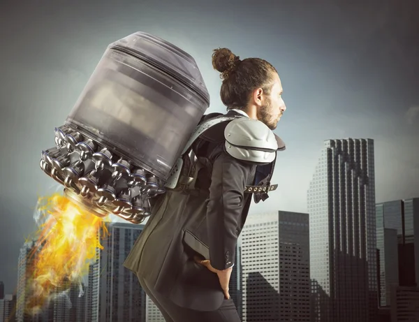 Businessman ready to start a rocket — Stock Photo, Image