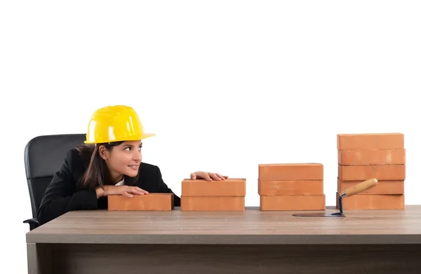 Woman architect admires her financial growth — Stock Photo, Image