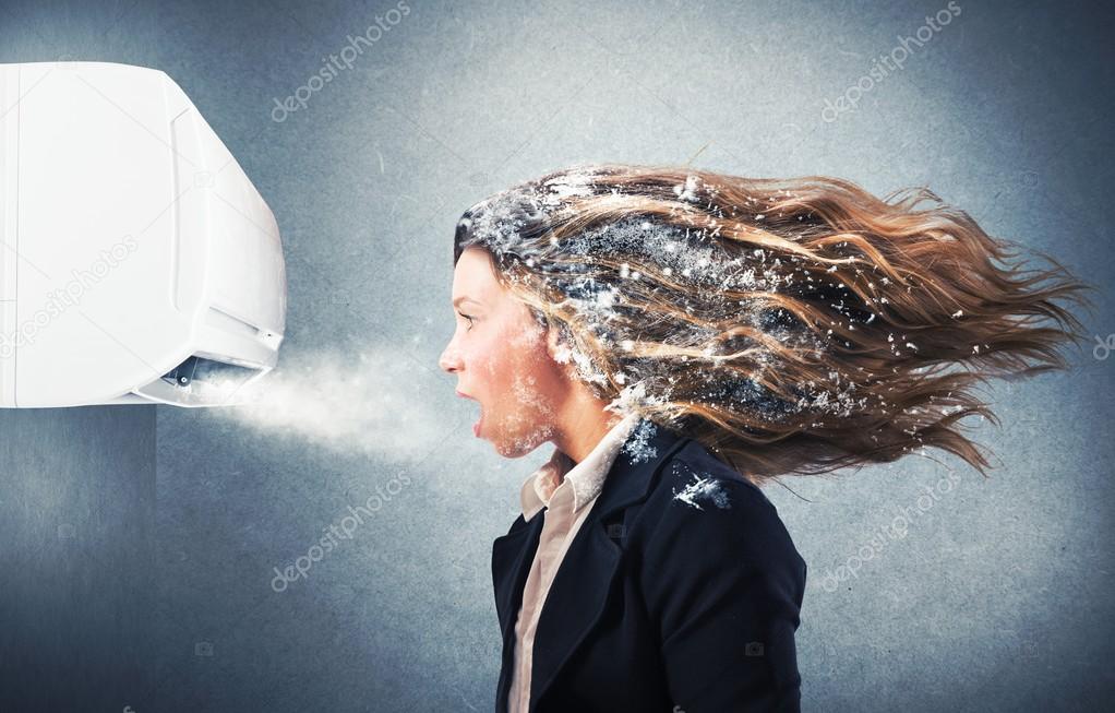 girl under a powerful air conditioner