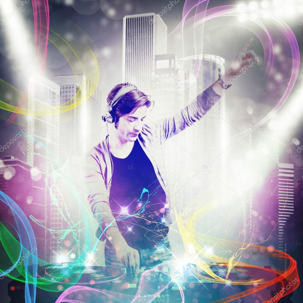 Dj mixing the music Stock Photo by ©alphaspirit 77856028