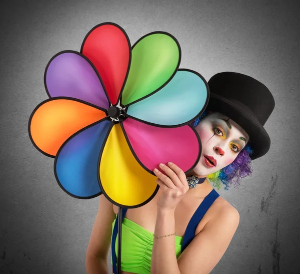 Woman clown with helix toy — Stock Photo, Image