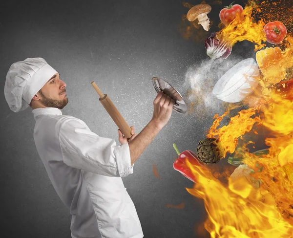 Cook is hiding by flames — Stock Photo, Image