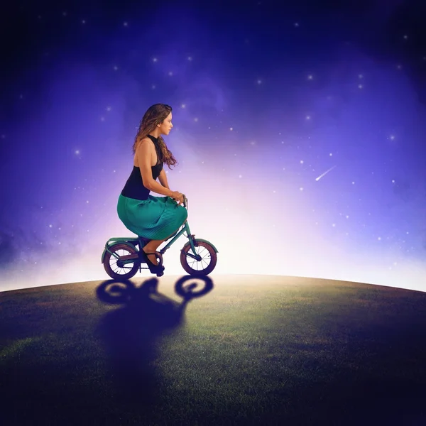 Girl with bike riding — Stock Photo, Image