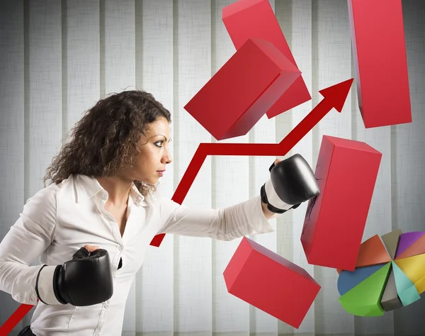 Businesswoman fights against crisis — Stock Photo, Image