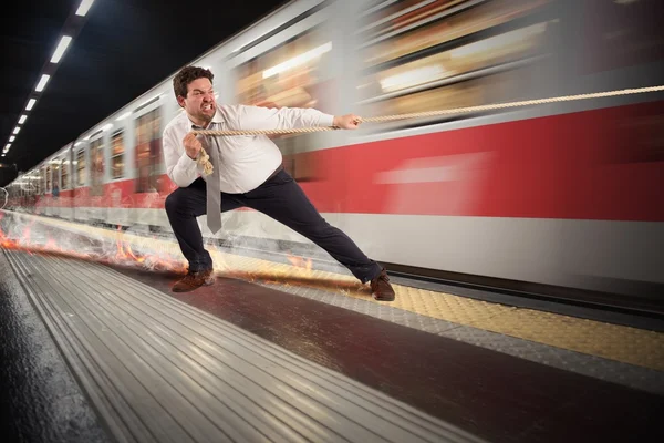 Man tries to stop the train — Stock Photo, Image