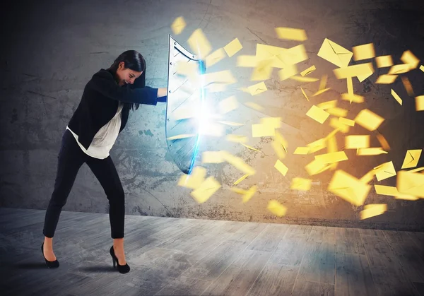 Businesswoman is protected with shield — Stock Photo, Image