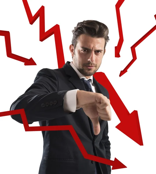 Businessman with statistical red arrows down — Stock Photo, Image