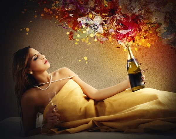 Woman opens a bottle of wine Stock Picture