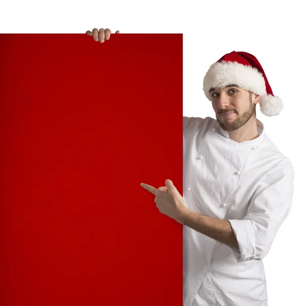 Chef shows a red billboard — Stock Photo, Image