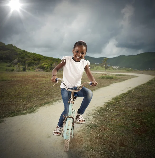 Little girl with bicycle — Stock Photo, Image