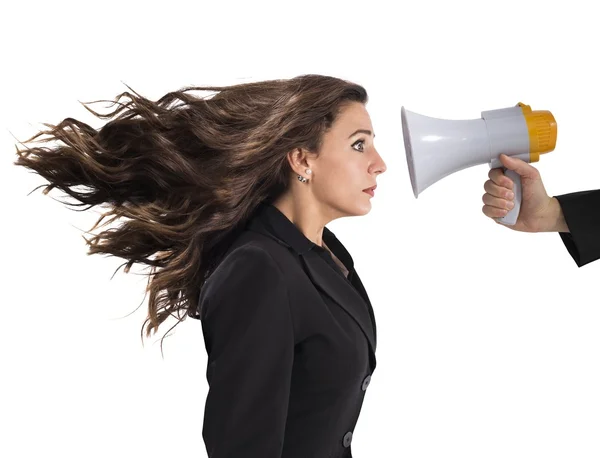 Businesswoman frightened by the megaphone — Stock Photo, Image