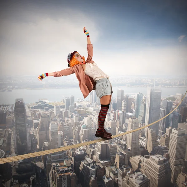 Woman clown on a rope — Stock Photo, Image