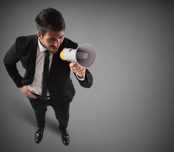 Empresario hablando en megáfono — Foto de Stock