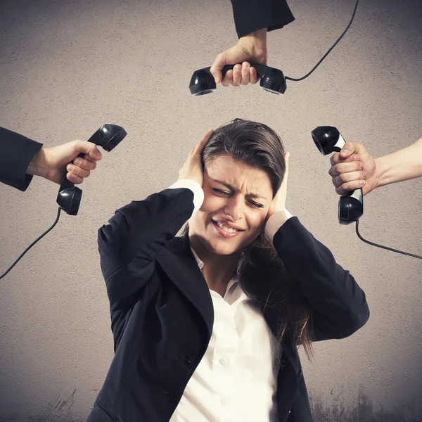 Businesswoman exhausted from business calls — Stock Photo, Image