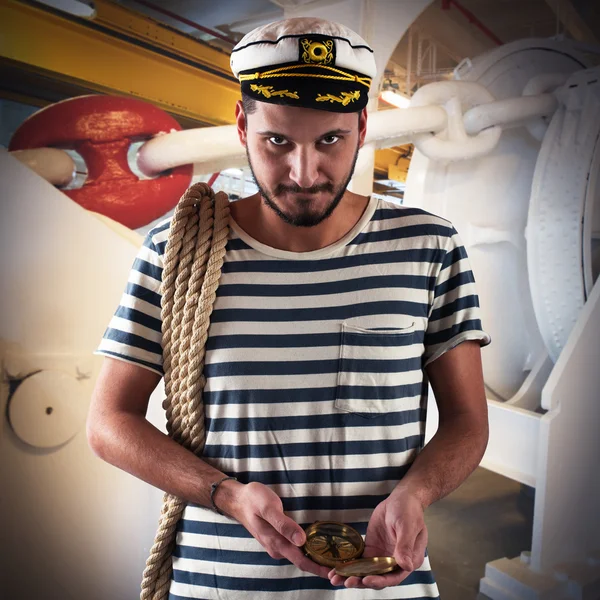 Sailor with compass on ship — Stock Photo, Image