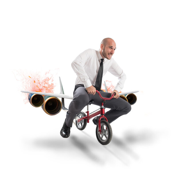 Бизнесмен с велосипедом с авиатурбинами
