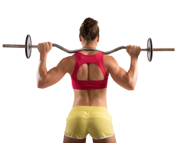 Mulher muscular levantando um outrigger — Fotografia de Stock