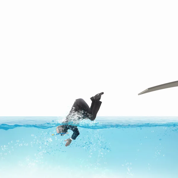 Businessman dives into the pool — Stock Photo, Image