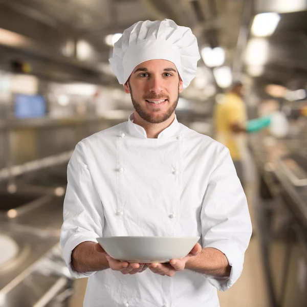 Chef holding his plate — Stock Photo, Image