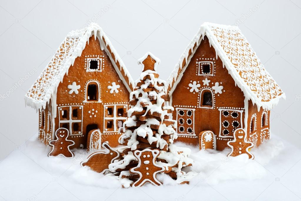 The hand-made eatable gingerbread houses and New Year Tree with 