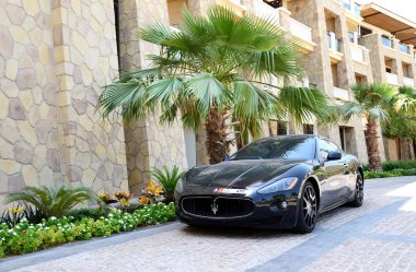 DUBAI, UAE - SEPTEMBER 9: The luxury Maserati Granturismo car is clipart