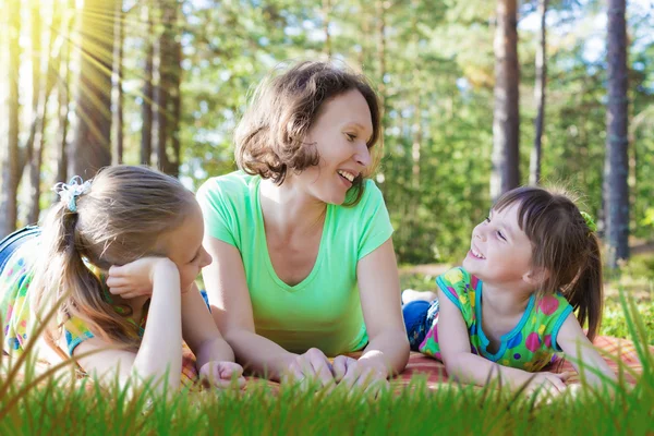 Beautiful mother and her daughters. — Stock Photo, Image