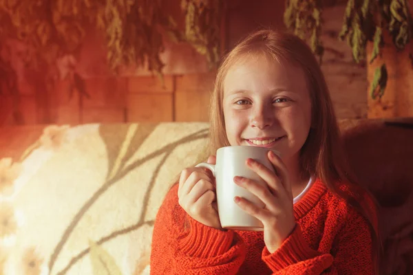 Young beautiful girl child with cup of coffee. — Stock Photo, Image