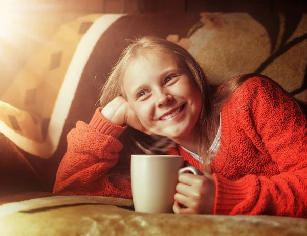 Young beautiful girl child with cup of coffee. — Stock Photo, Image