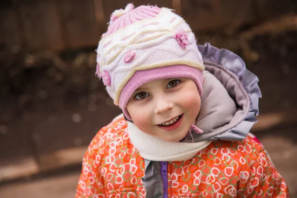 Happy child in warm clothes. — Stock Photo, Image